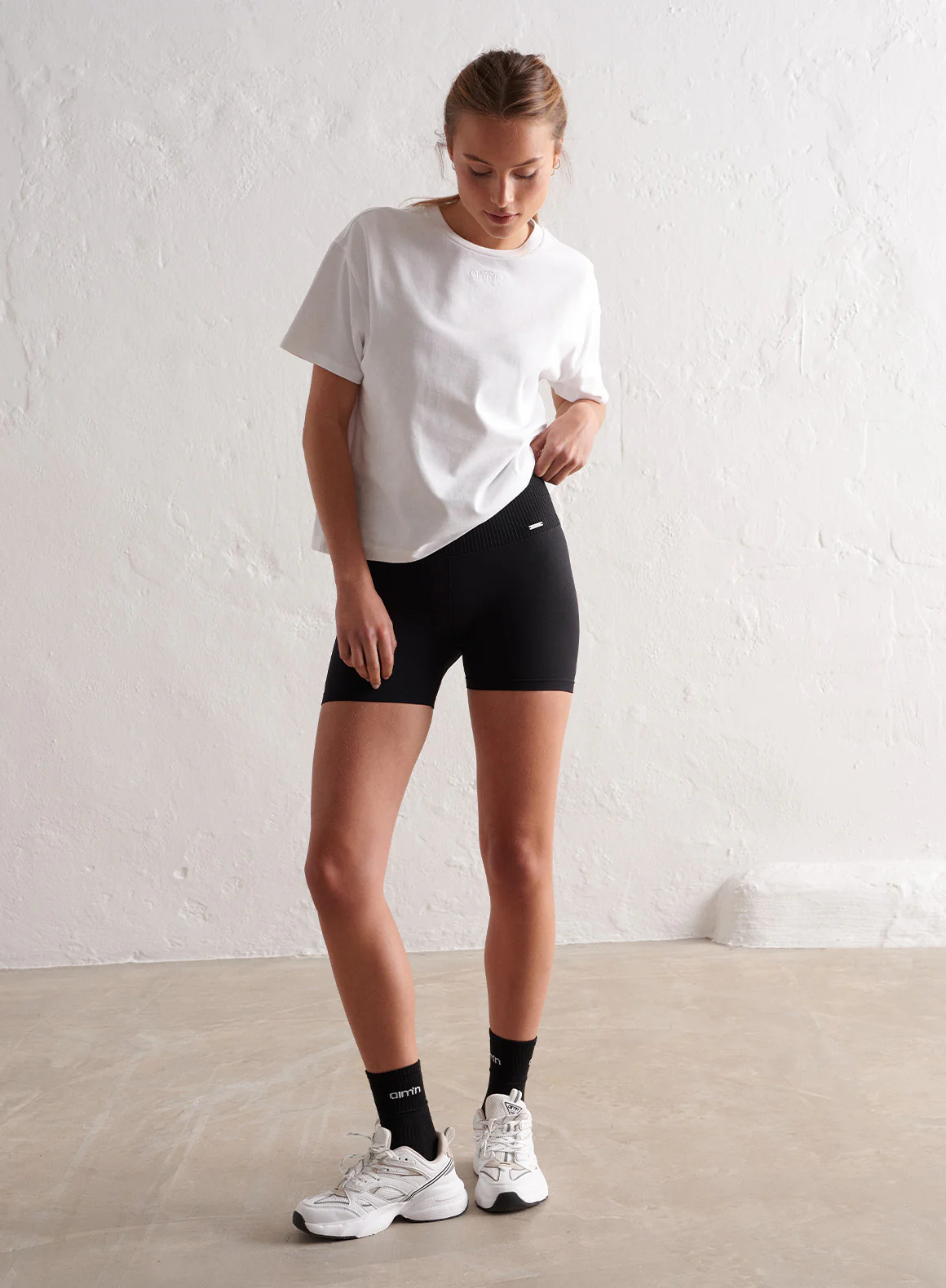 Black Limitless Seamless Midi Biker Shorts - Image 6